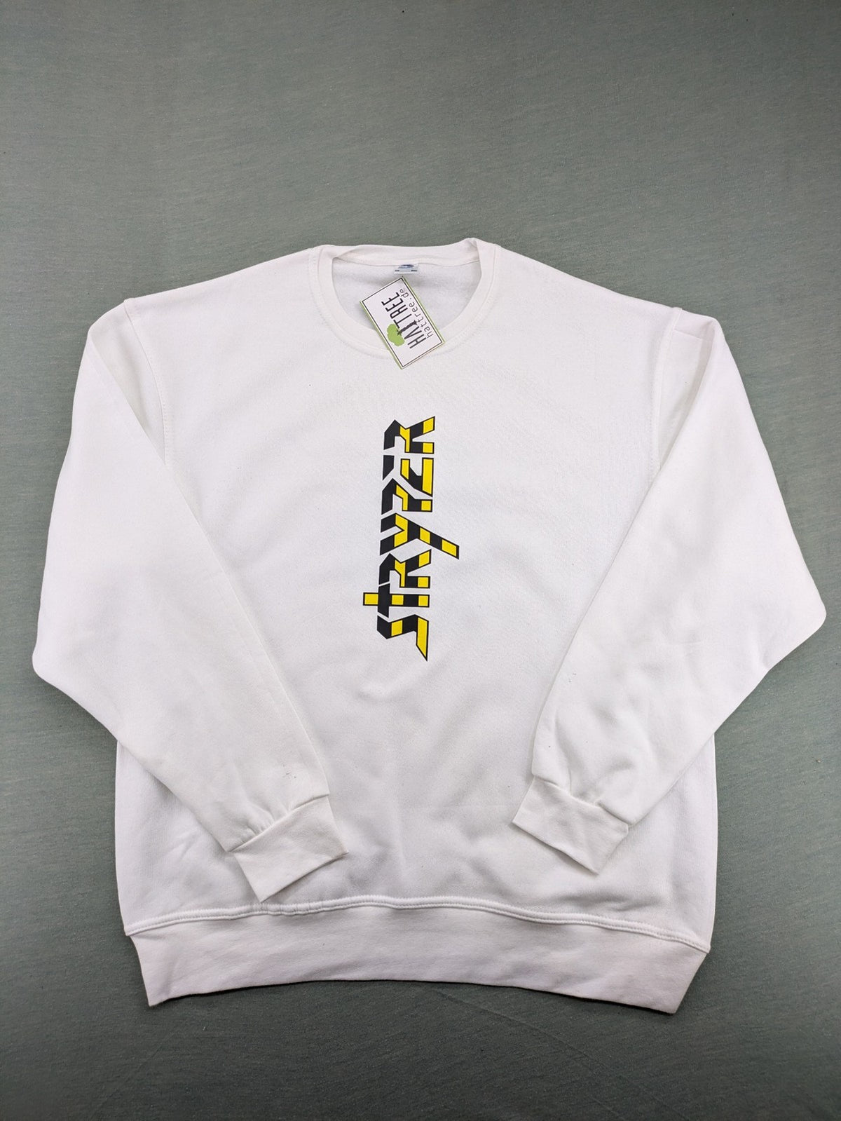 Stryper turtle neck jumper black with yellow vertical logo graphic on chest.