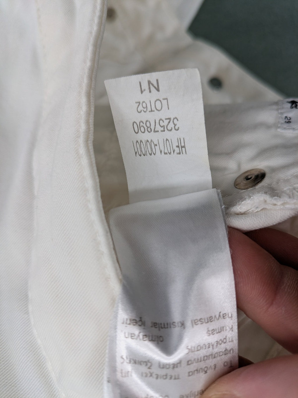 Lacoste white straight jeans high rise slim fit with logo and stretch denim material.