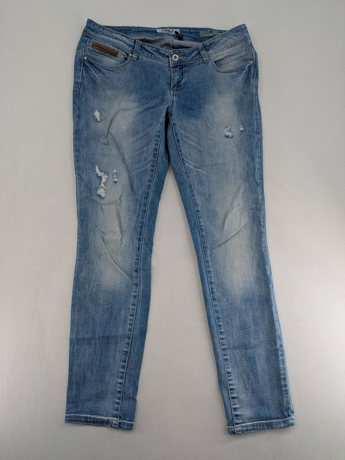 ONLY skinny jeans superlow coral orange pink distressed denim with modern used-look details.