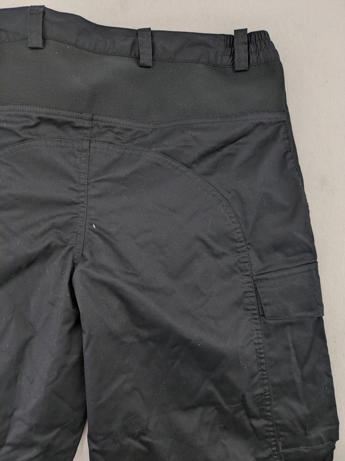DHL grey cargo pants with iconic logo and multiple pockets, made from stretch cotton.