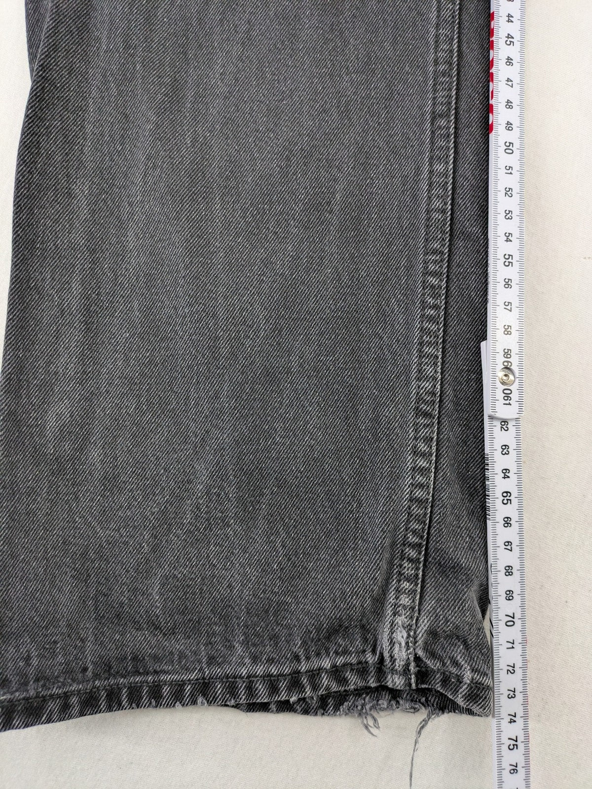Weekday grey straight jeans washed denim with button fly and classic fit.