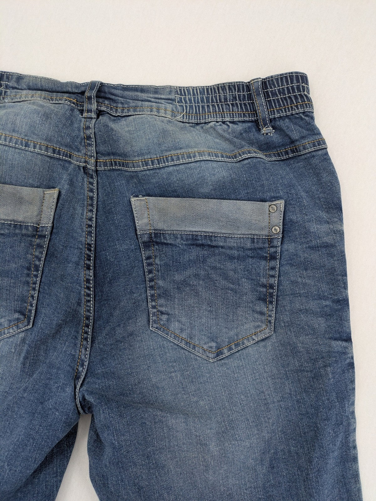 Up Fashion blue denim capri shorts, 5-pocket style, elastic waistband, soft cotton blend.