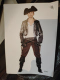 Wilbers brown pirate costume set with grey and white details, made of polyester.