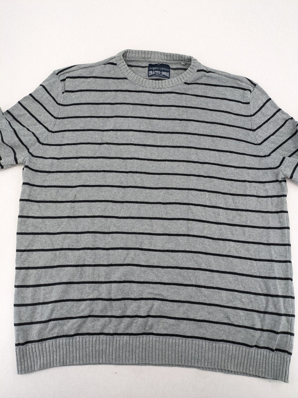 Angelo Litrico grey and black striped knit jumper, round neck, soft material.