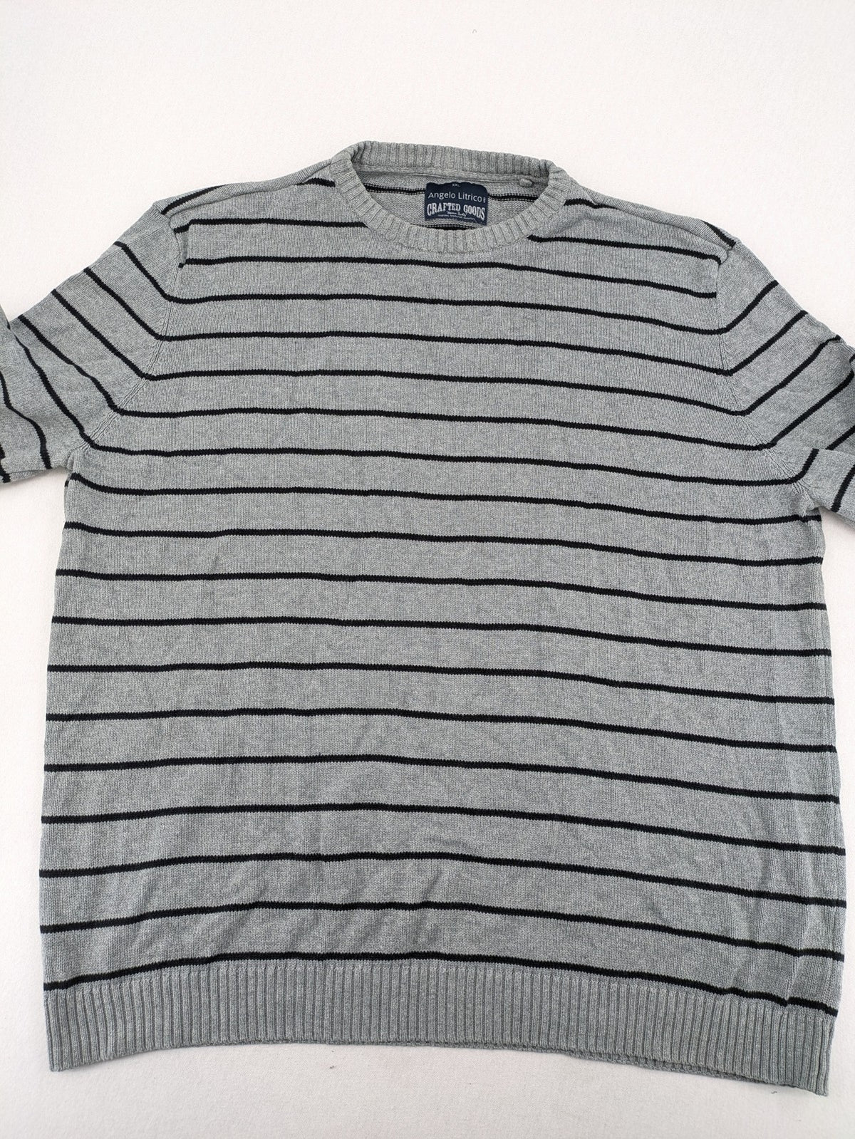 Angelo Litrico grey and black striped knit jumper, round neck, soft material.