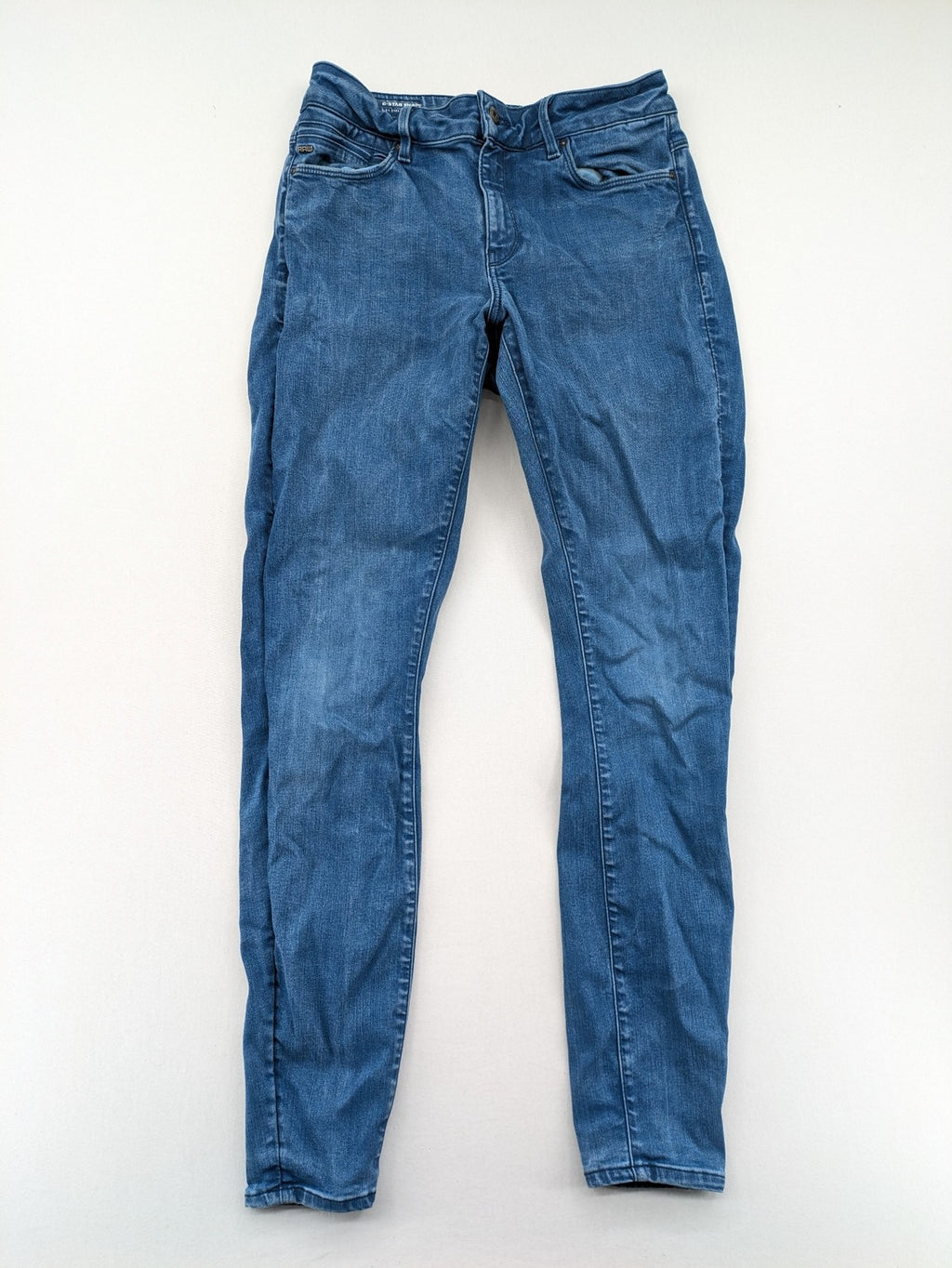 G-Star Raw blue high super skinny jeans with medium wash and logo details.