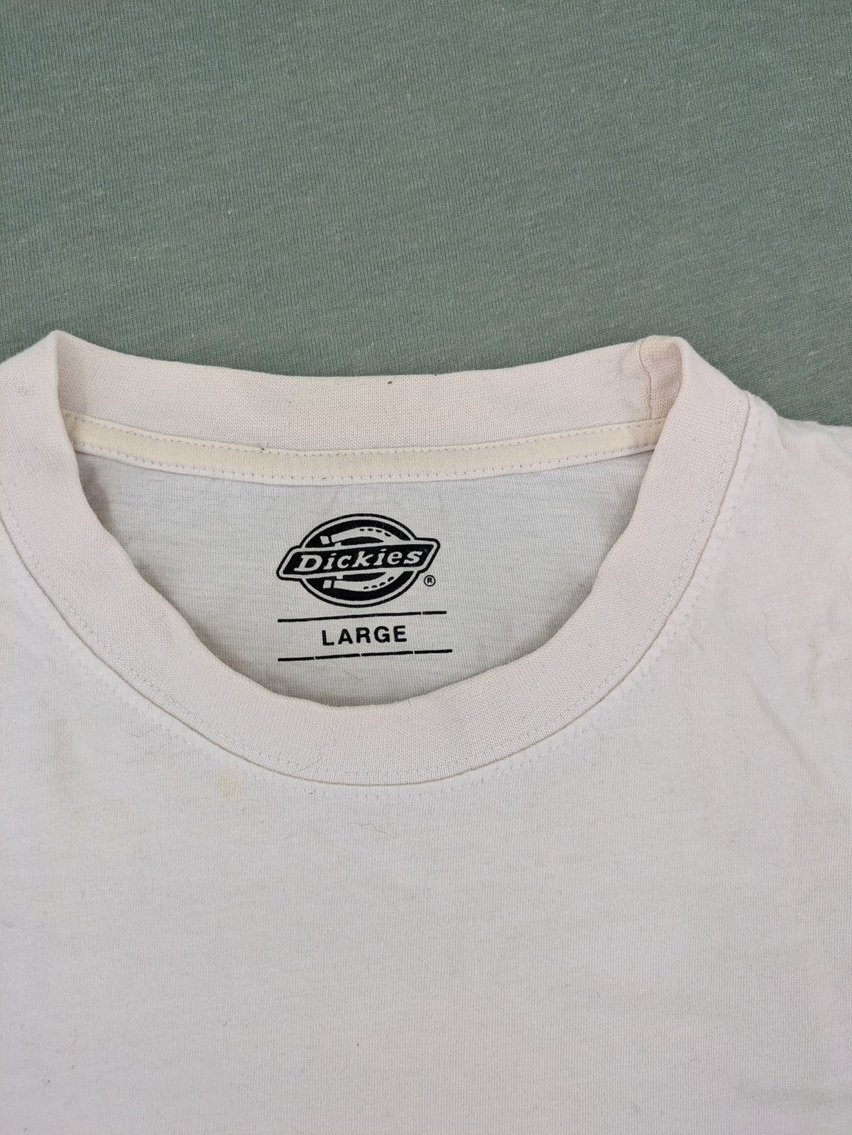 Dickies white t-shirt cotton short sleeve round neck with small logo patch.