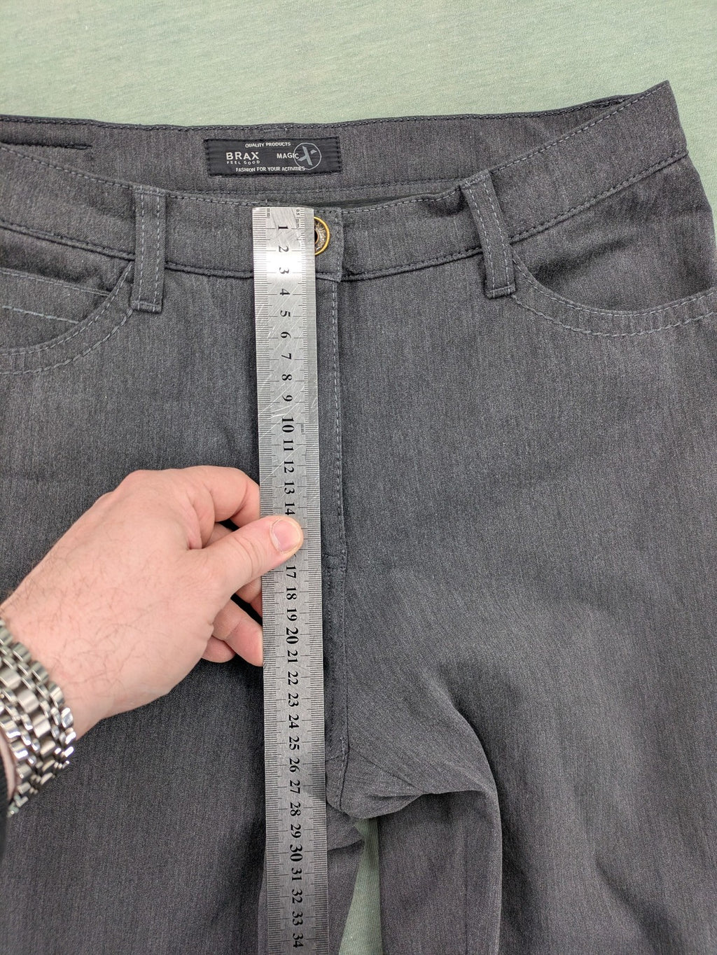 BRAX pants pink 5-pocket design with stretch material and logo detail.