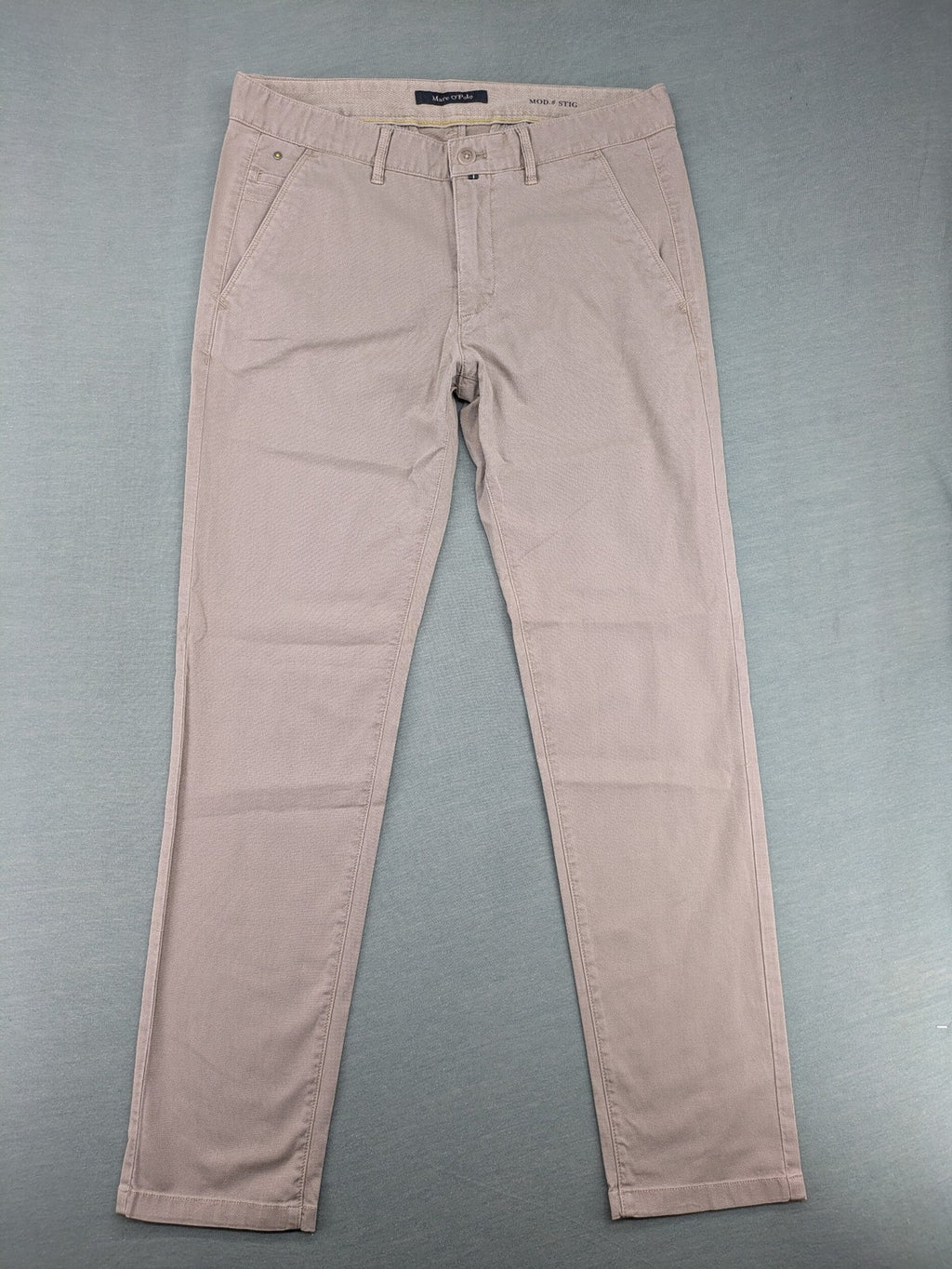 Marc O'Polo beige tapered fit chino pants, soft cotton stretch fabric, modern silhouette.