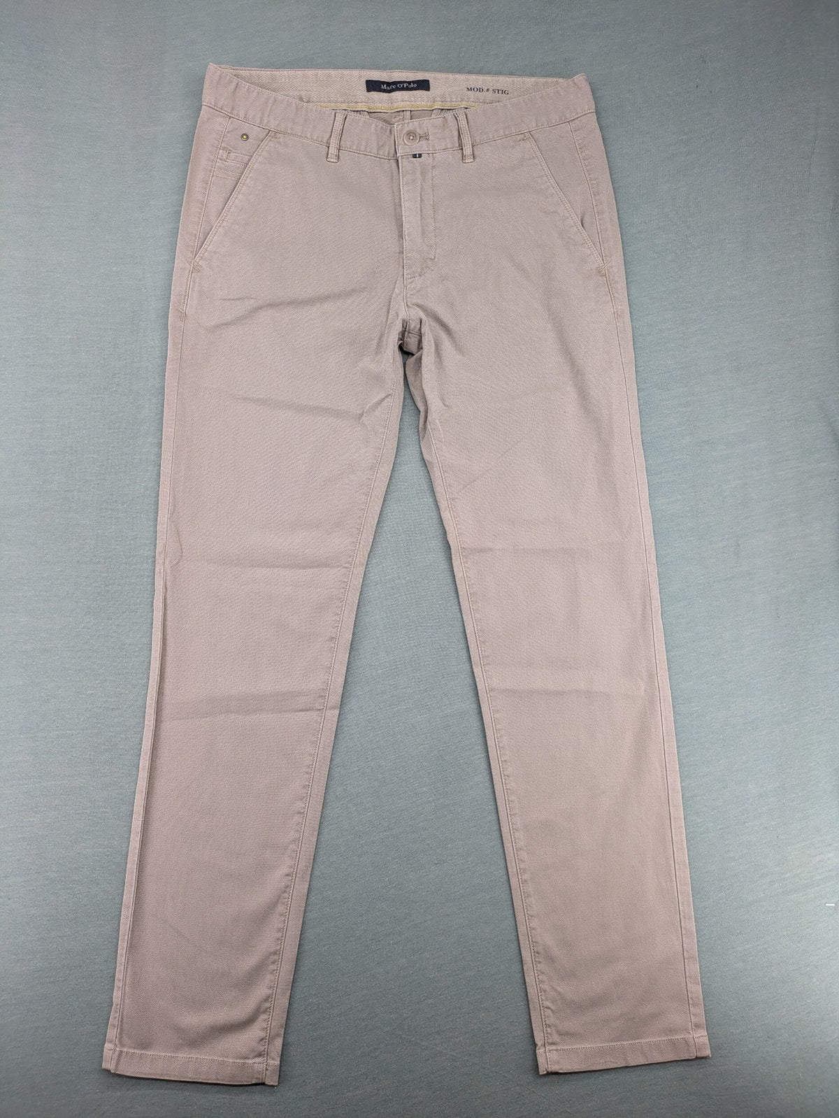Marc O'Polo beige tapered fit chino pants, soft cotton stretch fabric, modern silhouette.