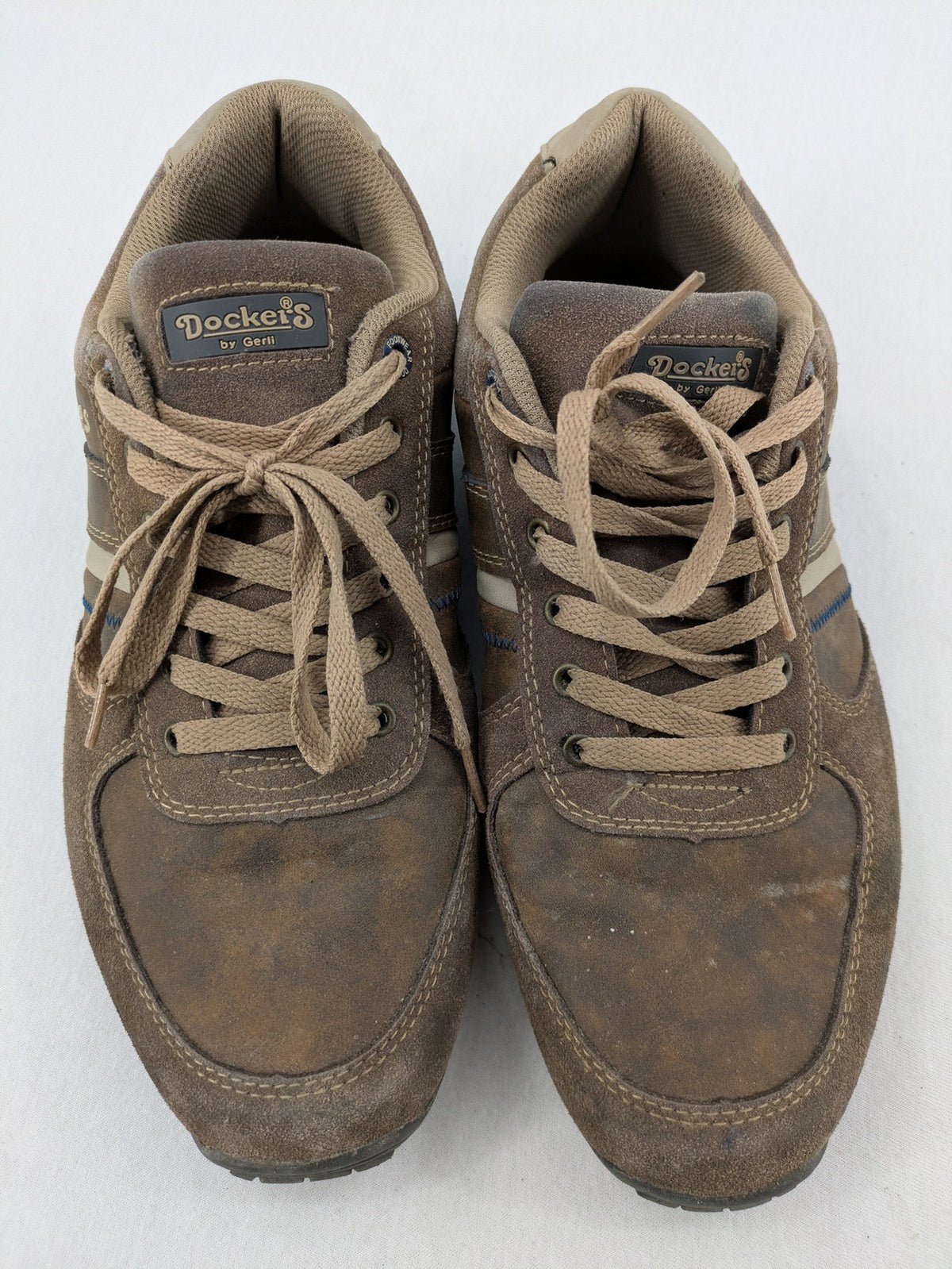Dockers brown sneakers with subtle light brown and blue accents, lace-up design.
