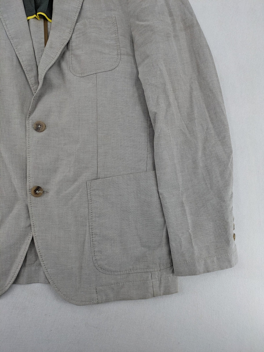 Camel Active grey cord blazer with classic two-button closure and practical zippered inner pockets.