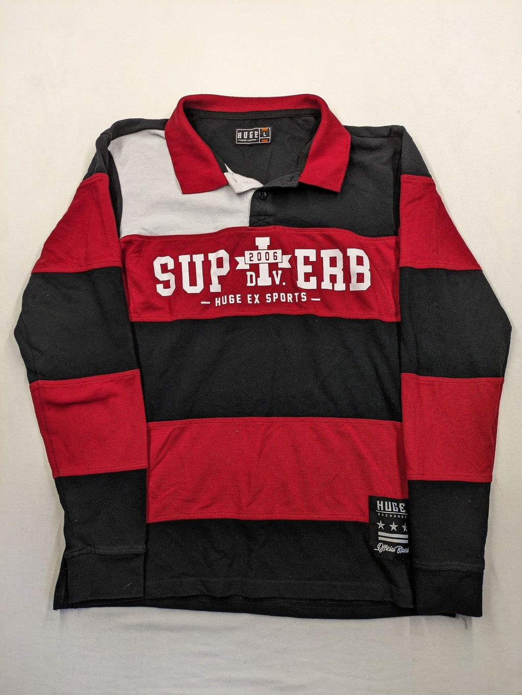 Huge Fashion Exchange rugby polo shirt red and black striped with "SUPERB" graphic.