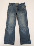 John F. Gee blue straight jeans with reinforced knees and durable denim material.