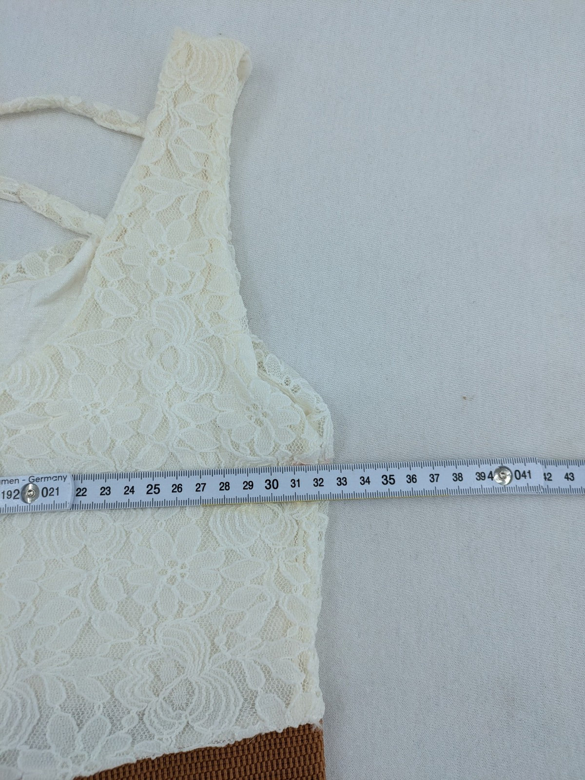 Boho multi summer dress white lace bodice with crossed straps and high-low hem.
