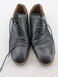 Zara Man black leather Oxford shoes with classic silhouette and durable modern sole.