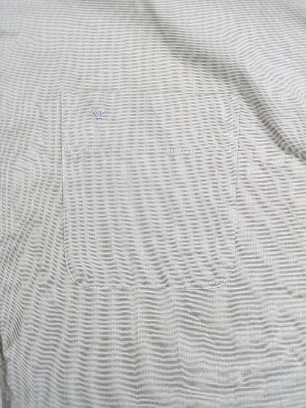 Seidensticker grey button-up shirt with subtle pattern and embroidered logo on pocket.
