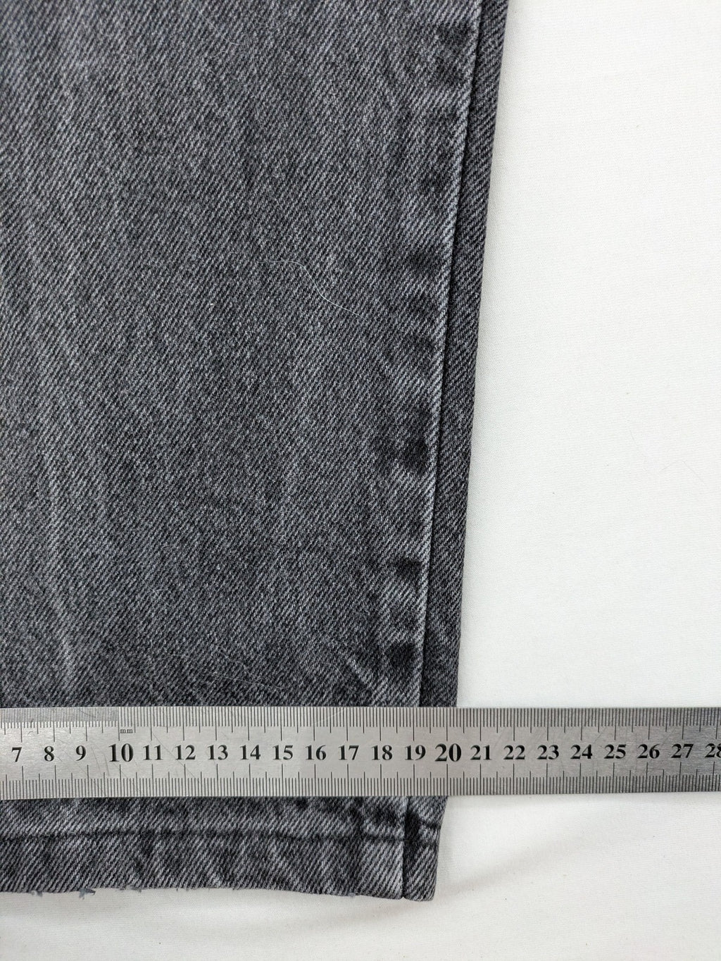Lucky Star grey tapered high waist jeans with faded wash and red logo details.