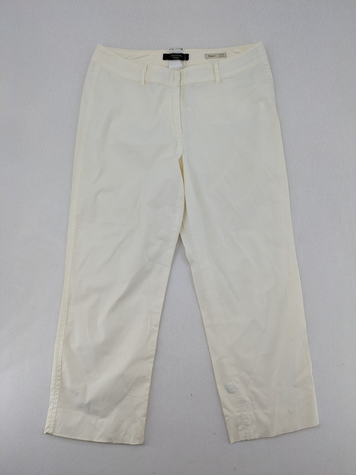 MaxMara cream cropped chino pants with zipper closure, belt loops, and back pockets.