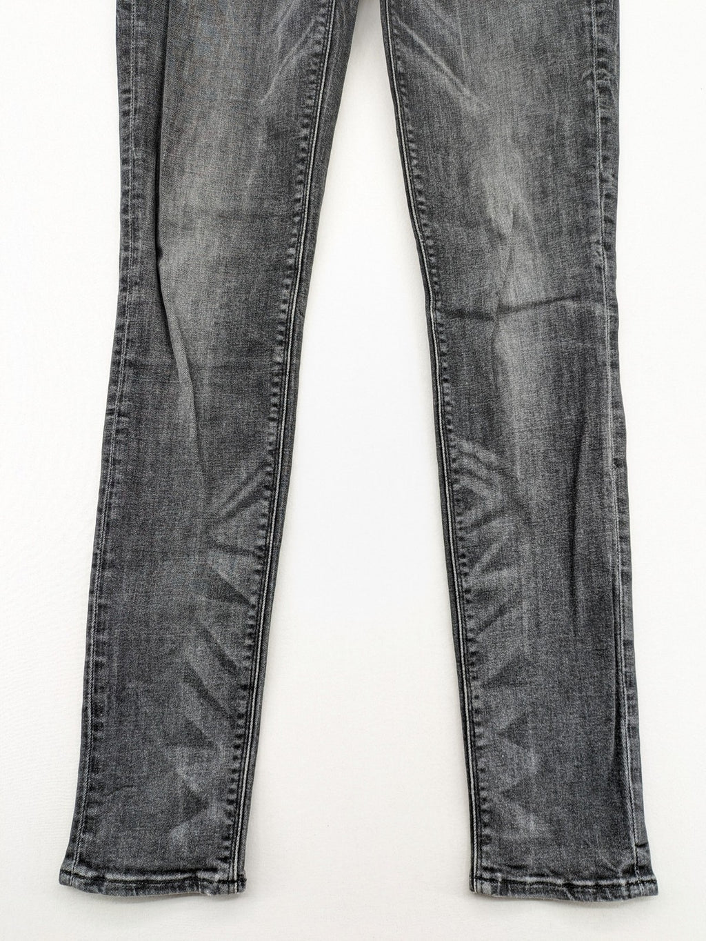 H&M grey skinny jeans with low rise, classic 5-pocket style, and washed denim finish.