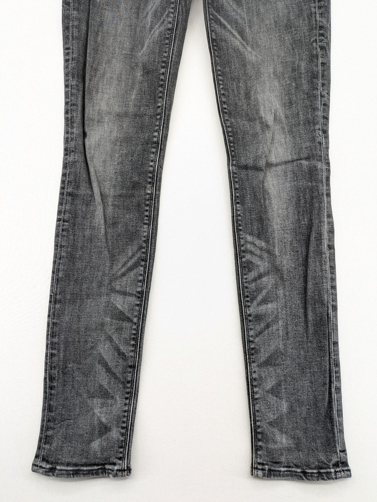 H&M grey skinny jeans with low rise, classic 5-pocket style, and washed denim finish.