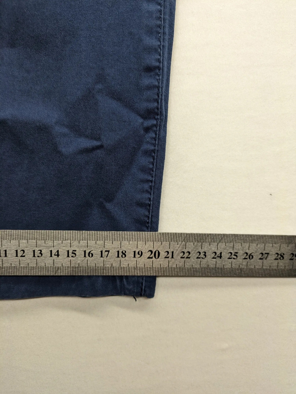Angels blue straight jeans with five-pocket design and vertical front seams.