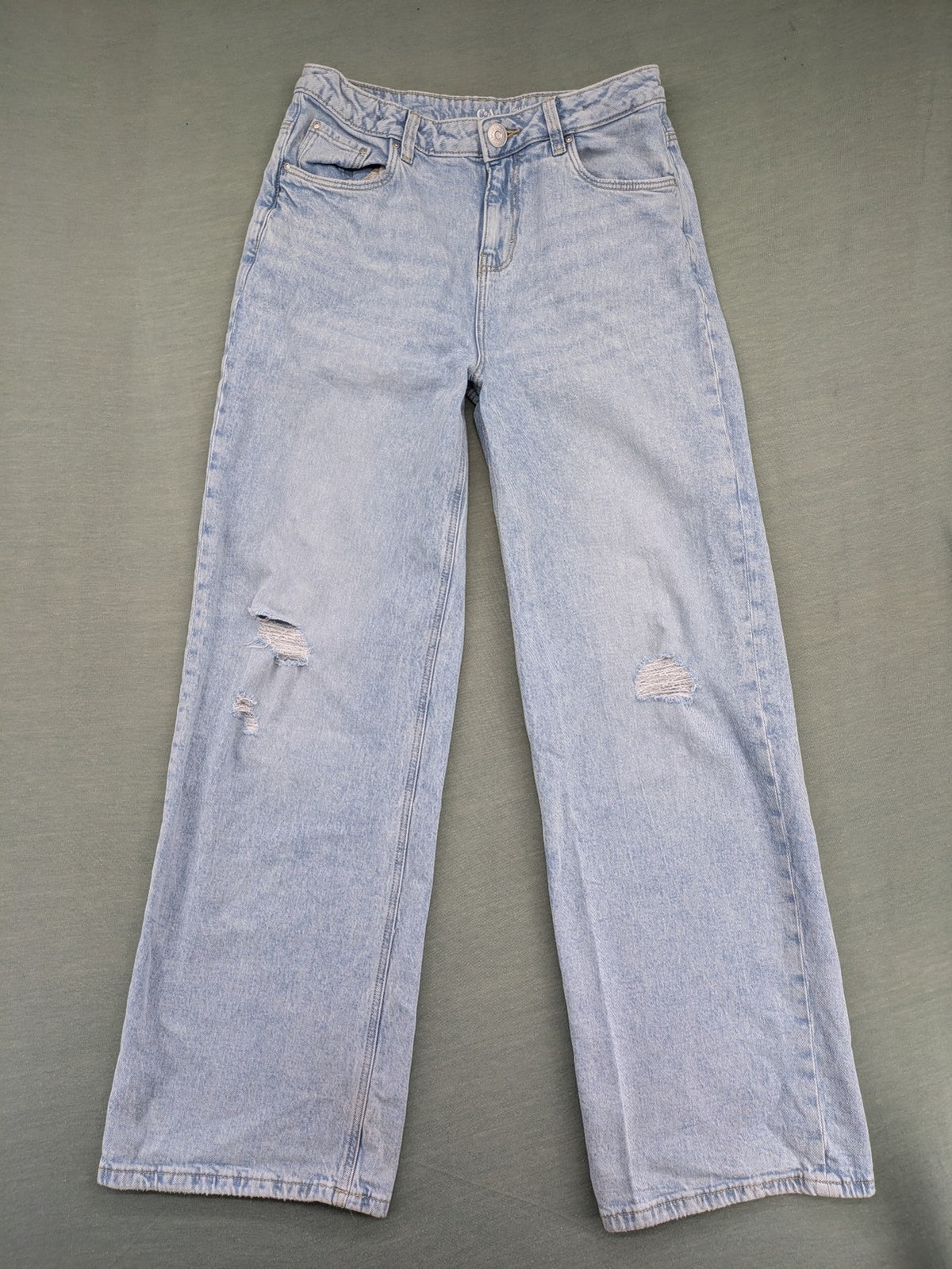 C&A blue wide leg jeans with distressed knee details and classic five-pocket design.
