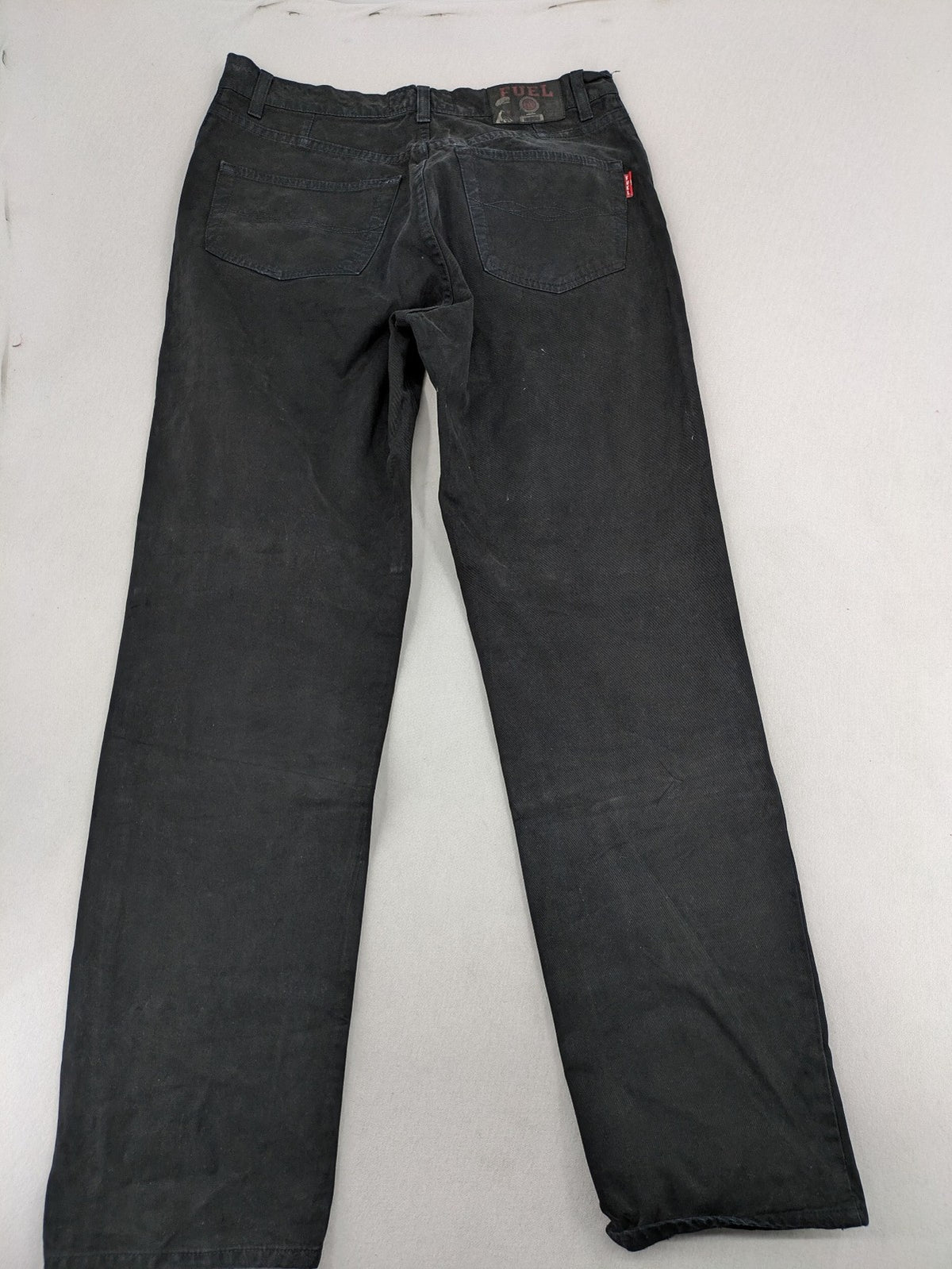 Fuel black straight jeans with 5-pocket design and branded leather patch.