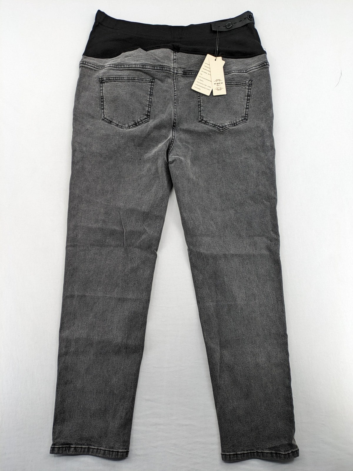 Damen grey maternity pants with black elastic belly band and stretch fabric.