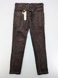 Alma & Lovis cream cord pants high-waist with matching belt and front pockets.