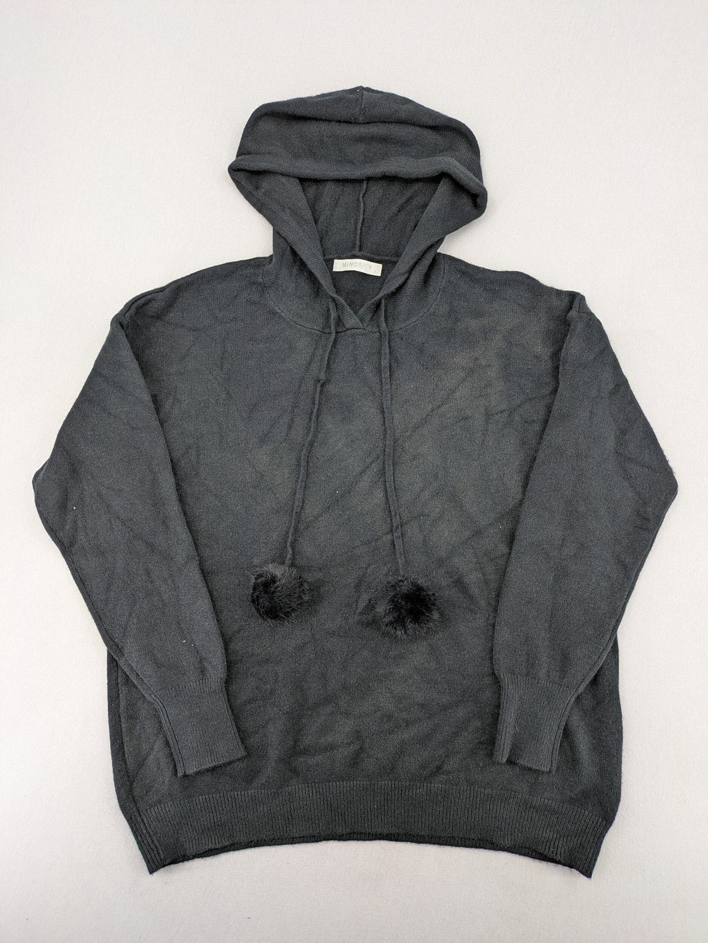 M/L grey hoodie with playful pom-poms and soft viscose blend material.