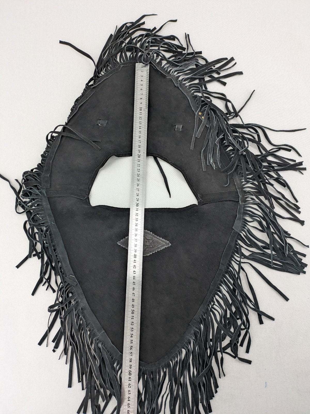 Stars & Stripes black suede fringe vest with silver conchos and beaded tassels.