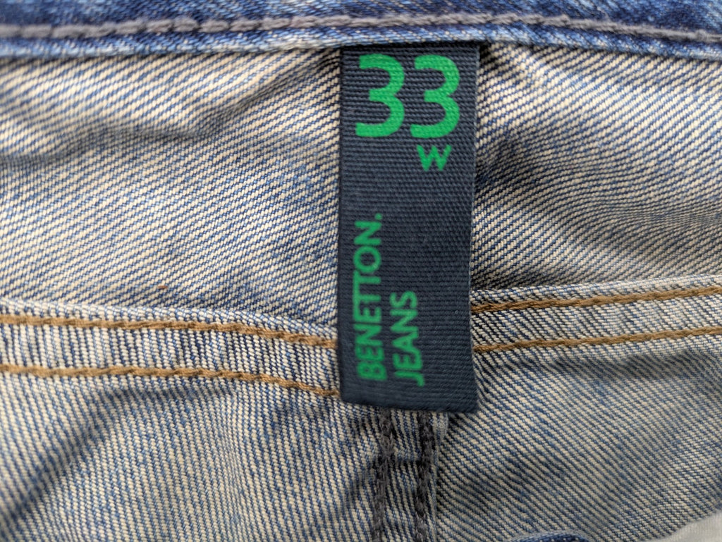 Benetton Jeans blue straight leg denim with button fly and classic design.
