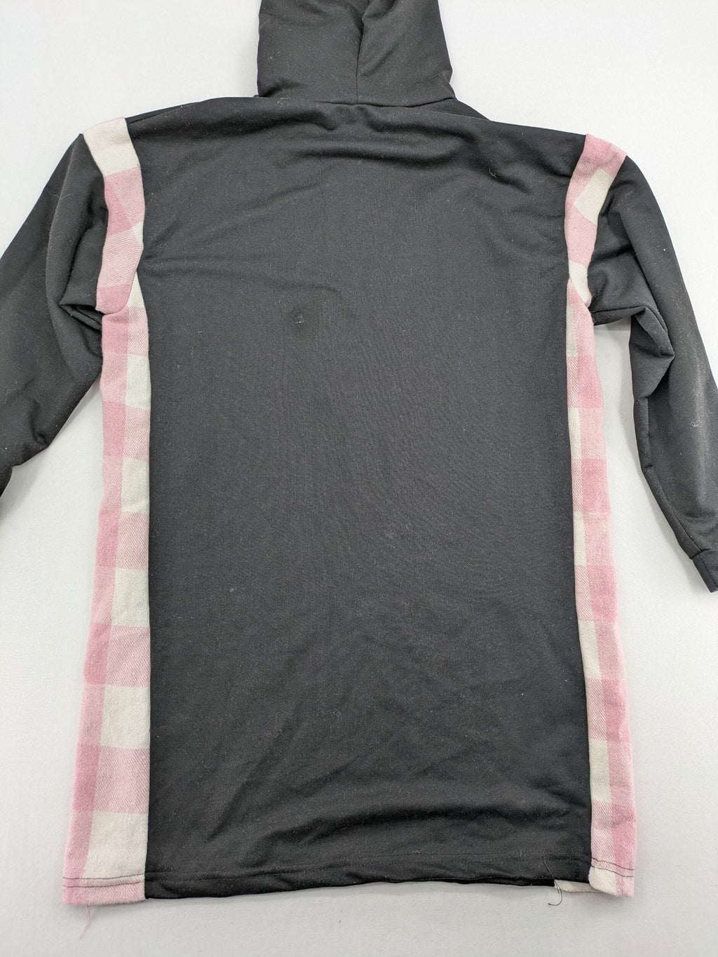 L'ange pink hoodie dress with black body and contrasting pink-white checkered panels.