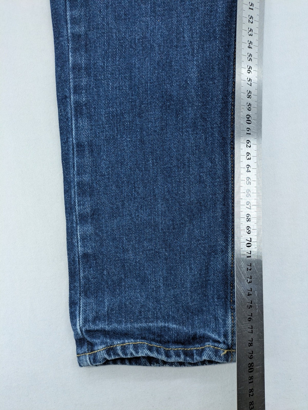 Hollister blue super skinny jeans medium wash button fly with faded details.