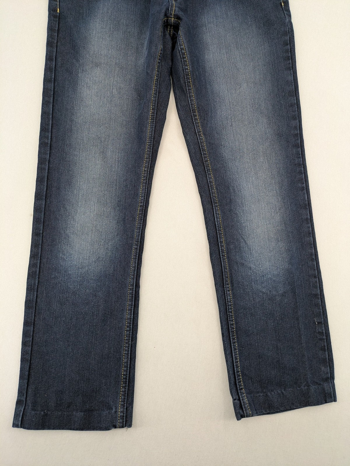 C&A blue straight leg jeans with classic 5-pocket design and faded wash details.