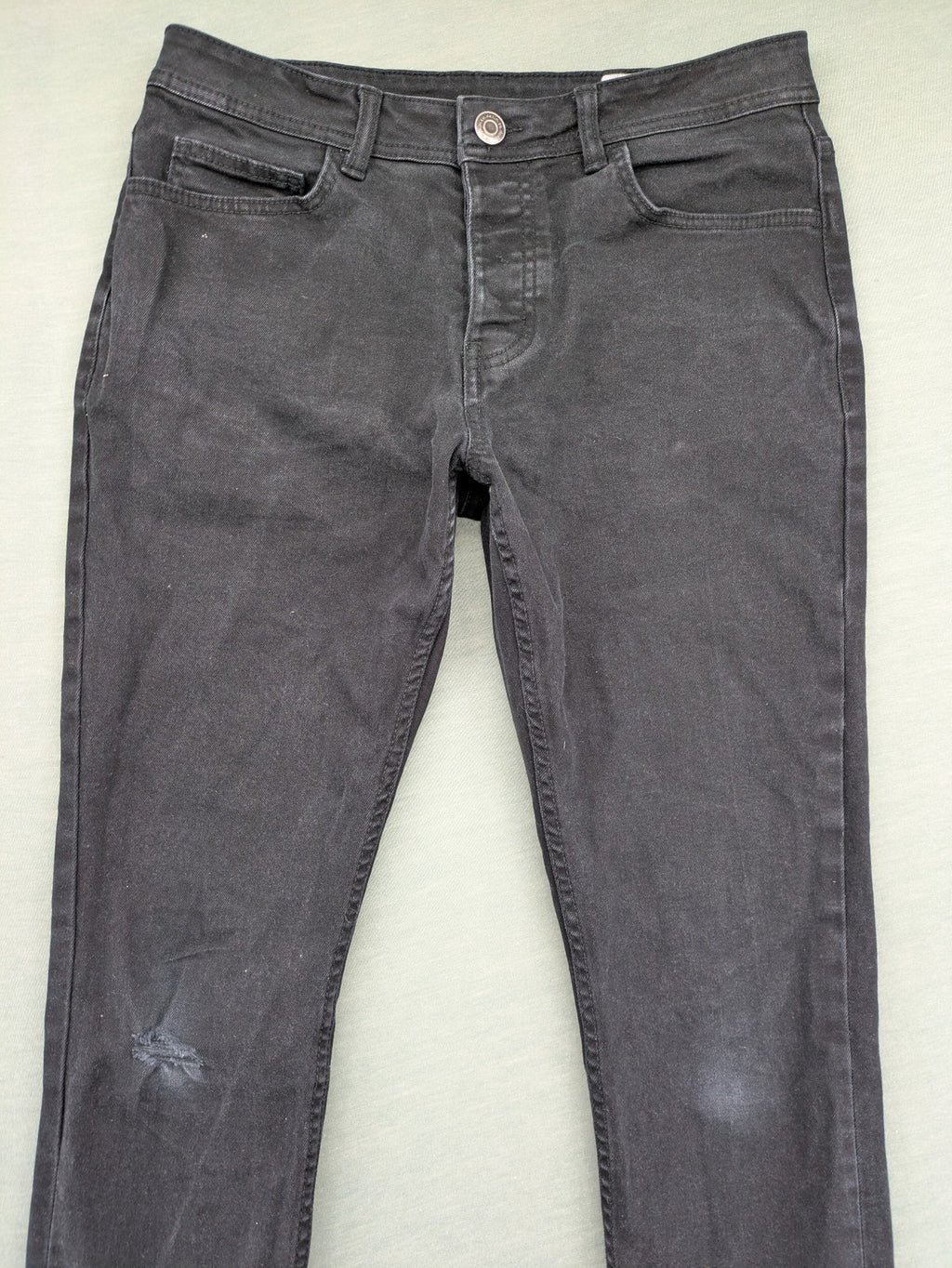 Denim & Co. grey slim fit jeans with button fly and classic 5-pocket design.