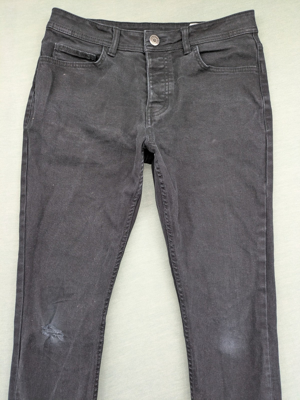 Denim & Co. grey slim fit jeans with button fly and classic 5-pocket design.