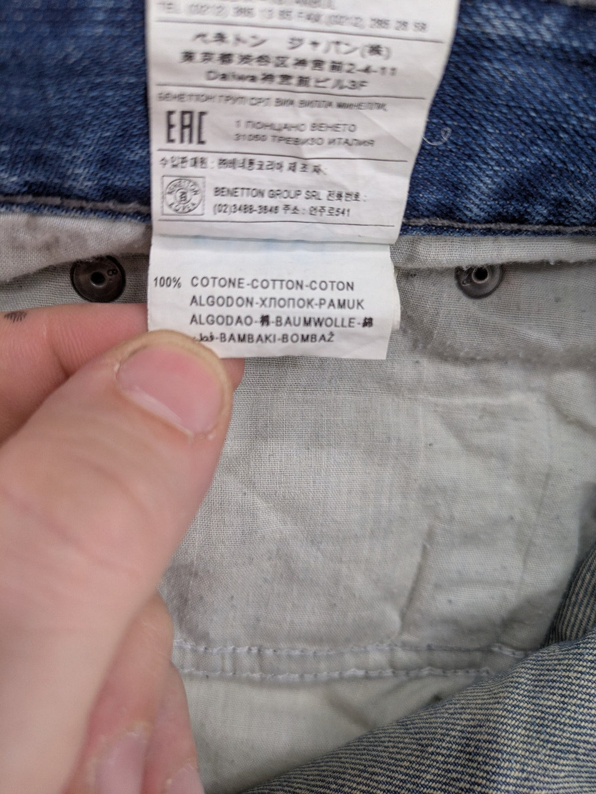 Benetton Jeans blue straight leg denim with button fly and classic design.