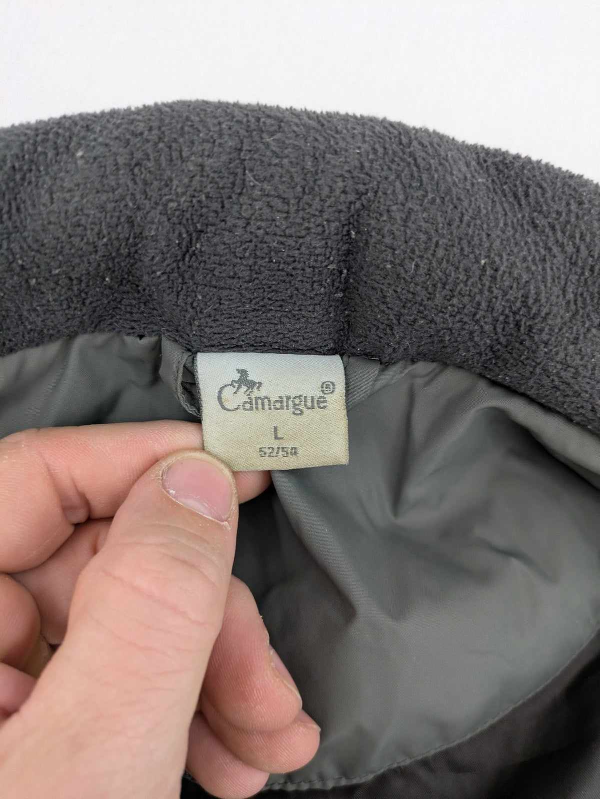 Camargue grey quilted jacket with fleece collar and buttoned pockets.
