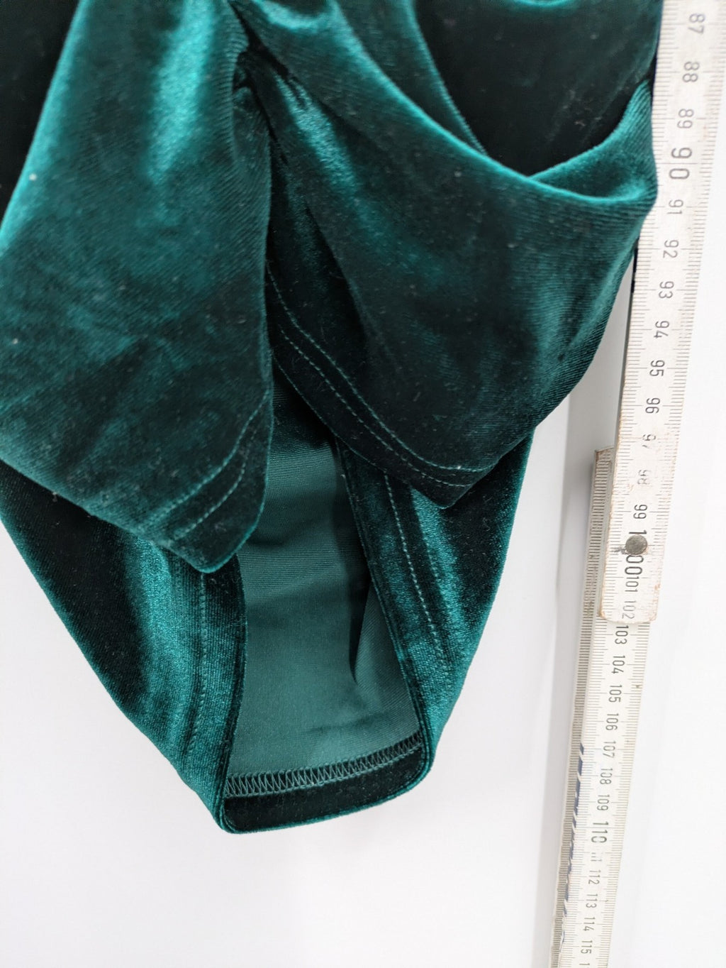 SHEIN green bodycon dress with ruched details, square neckline, and long puff sleeves.