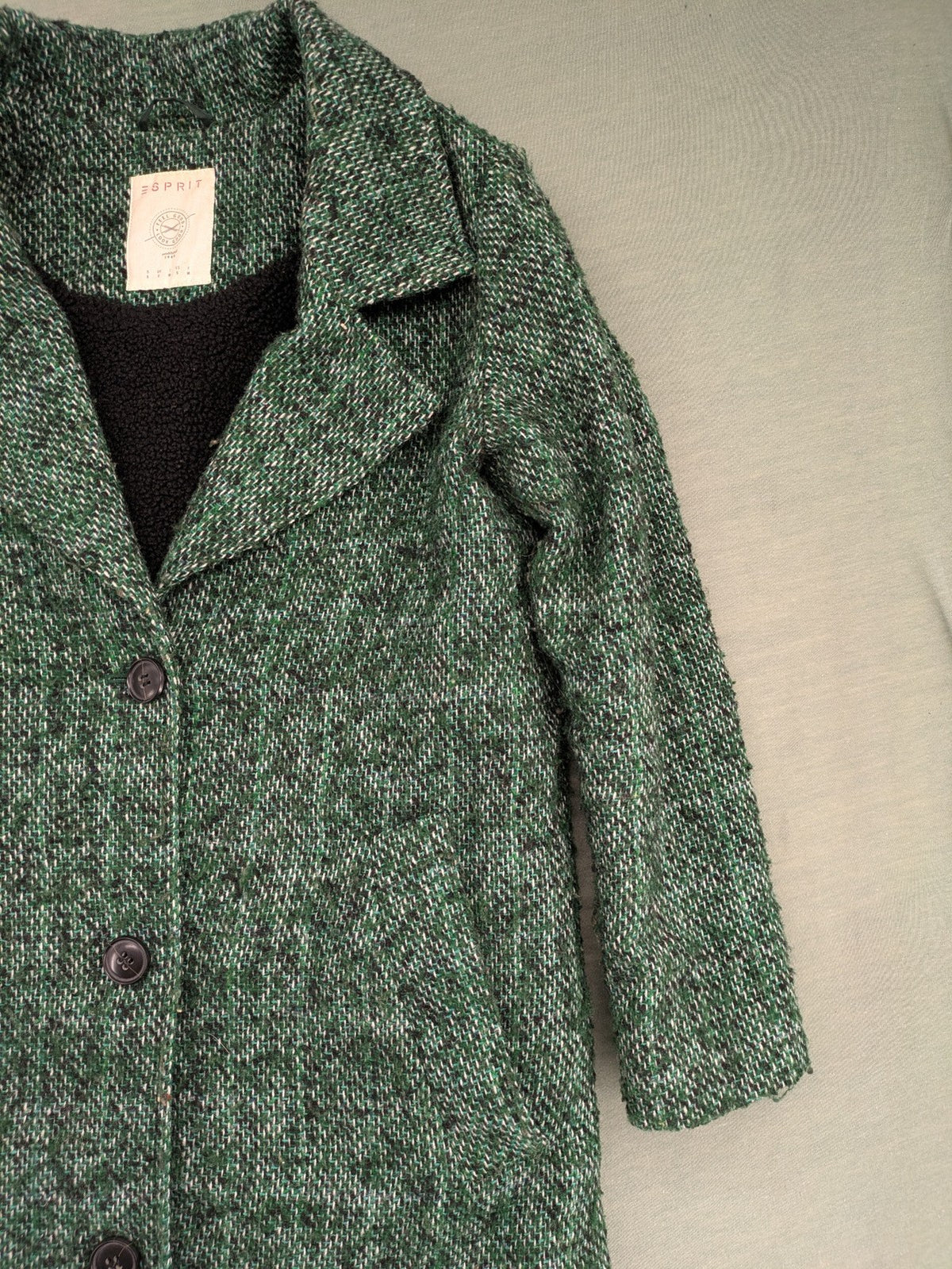 Esprit green black white tweed coat with notch collar and three-button closure.