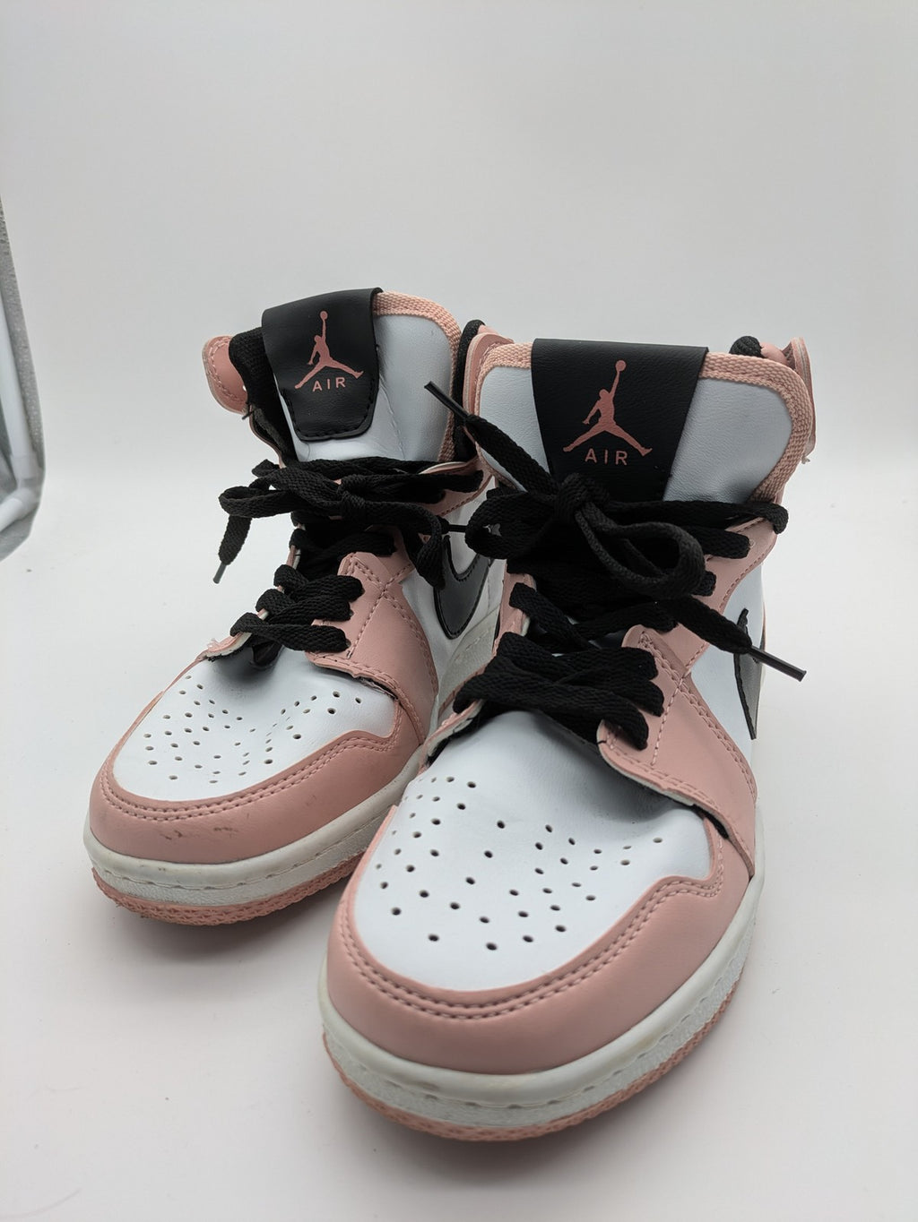 Nike Air Jordan high-top sneakers multi with Wings logo, Jumpman detail, and perforated toe.