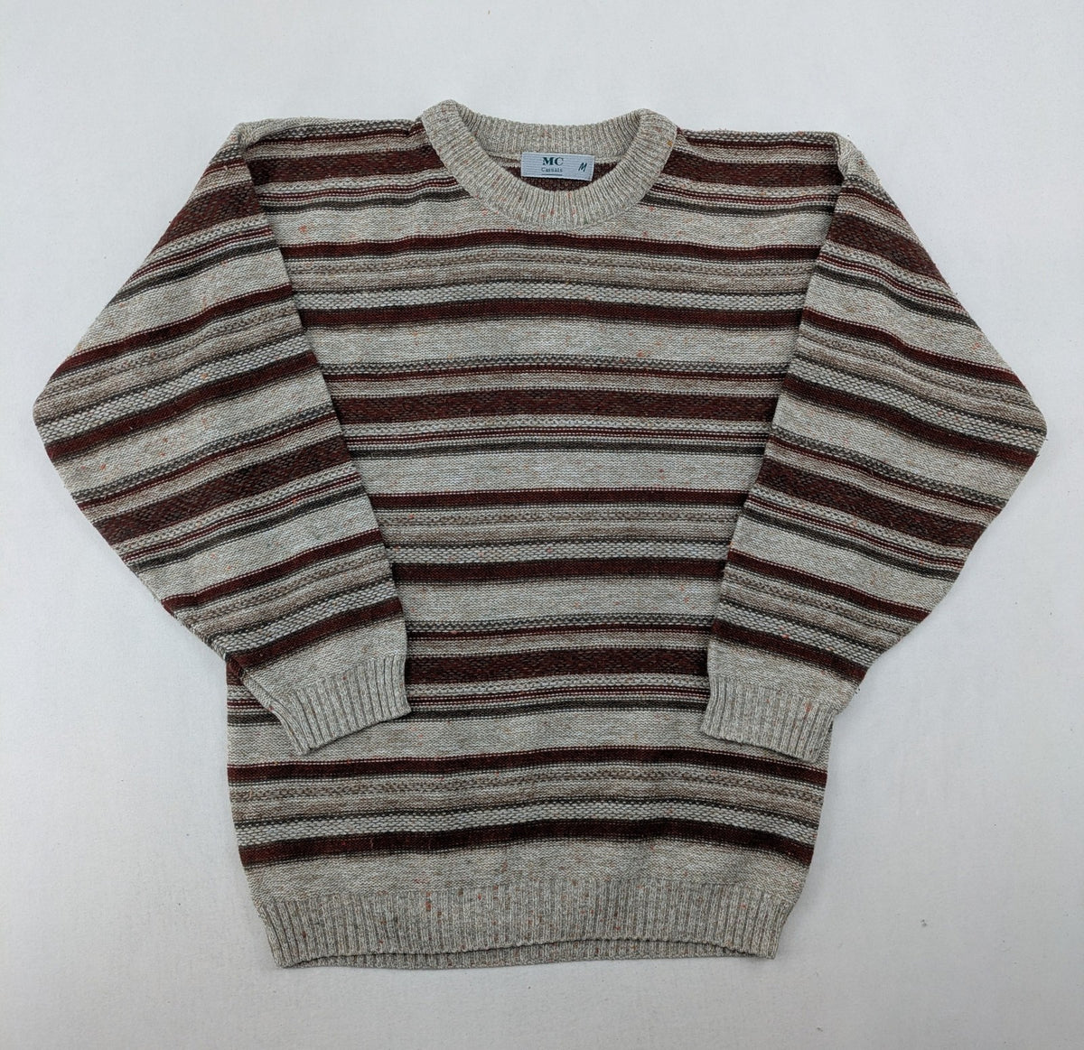 MC Casuals multi turtle neck jumper vintage striped pattern in brown and grey acrylic.