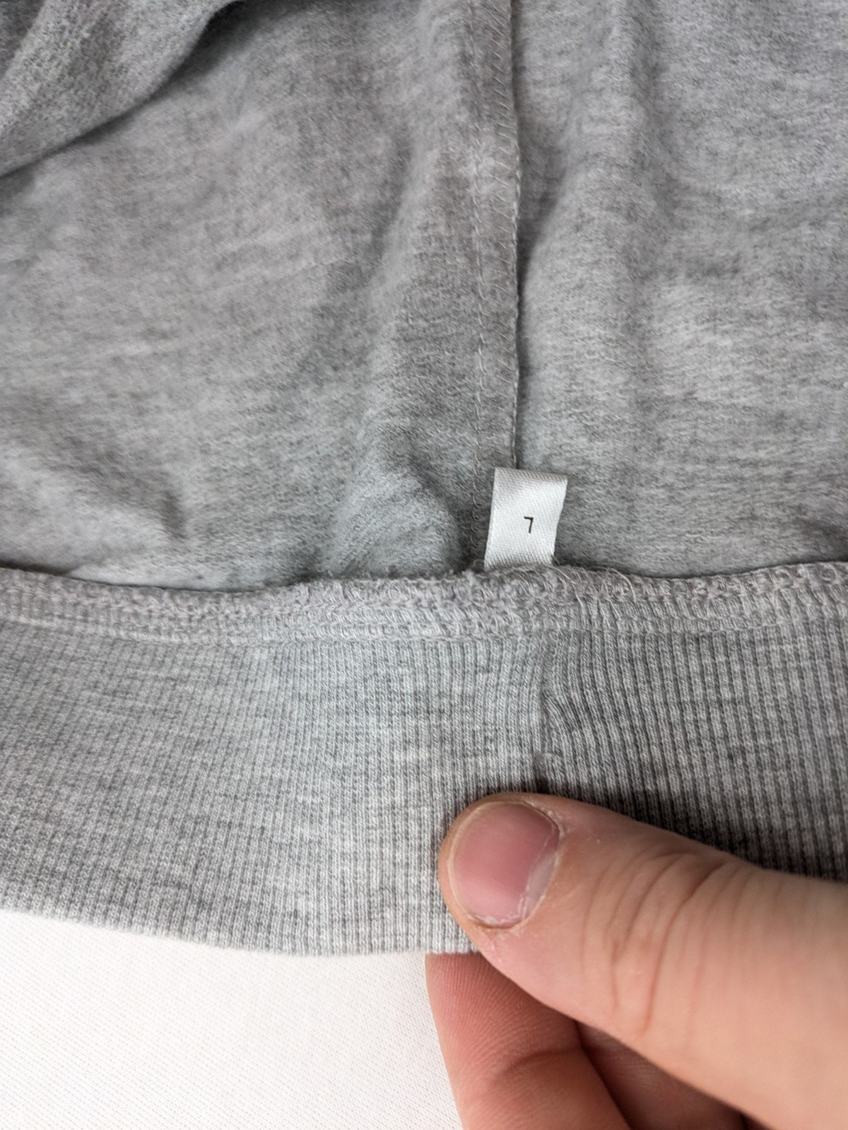 Fortnite pants grey with black side stripes and large logo print, cotton blend material.