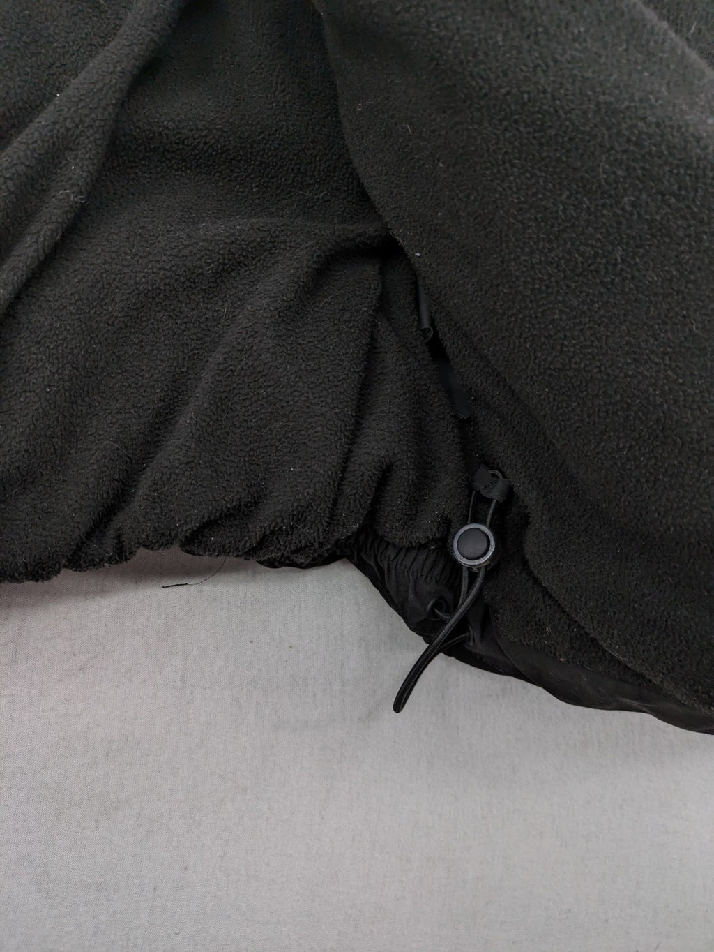 Pull&Bear black puffer coat with high collar, fleece lining, and quilted design.