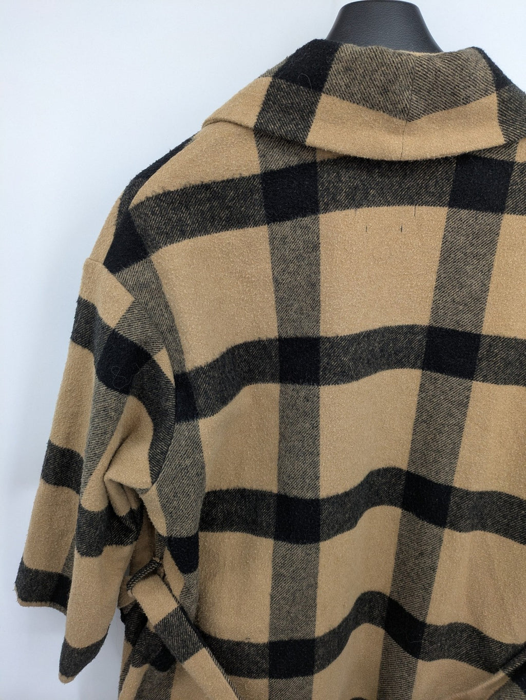 Reserved cream coat with brown and black check pattern, fringe hem, wool blend material.