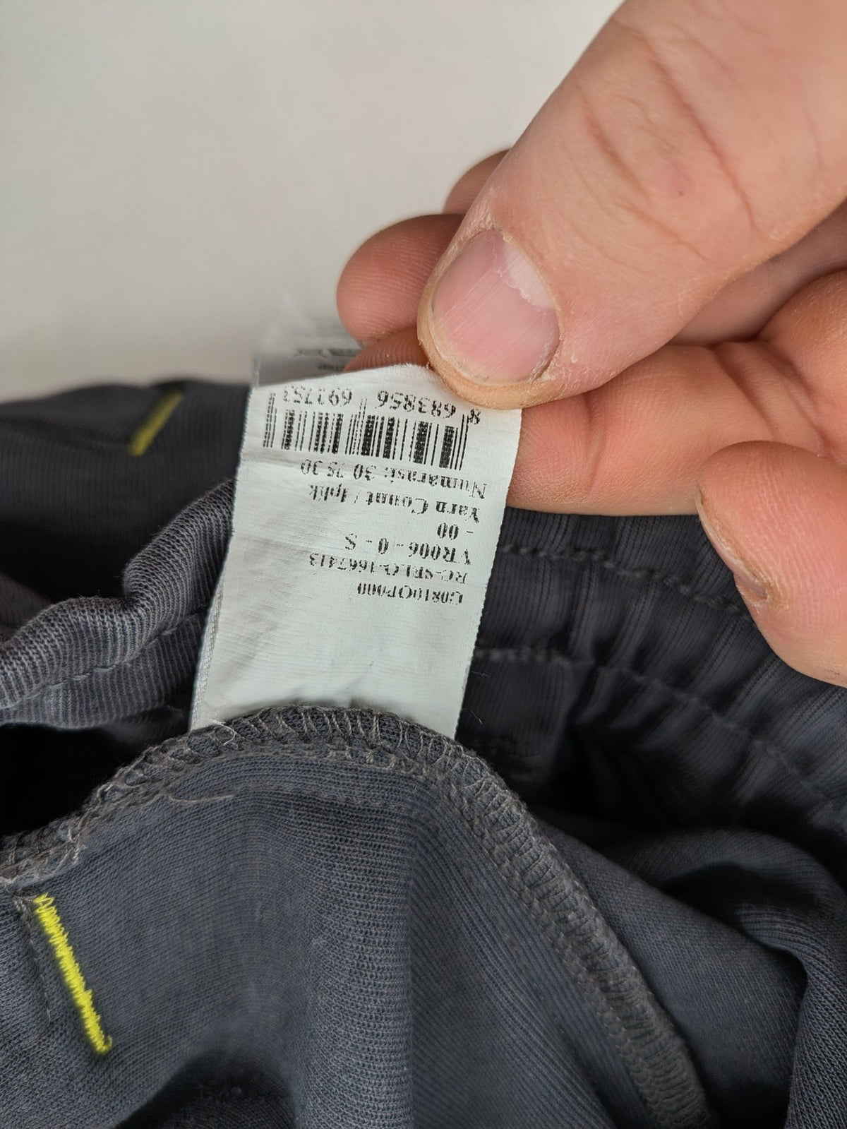 US Polo Assn grey sweatpants with light green drawstring and subtle logo detail.