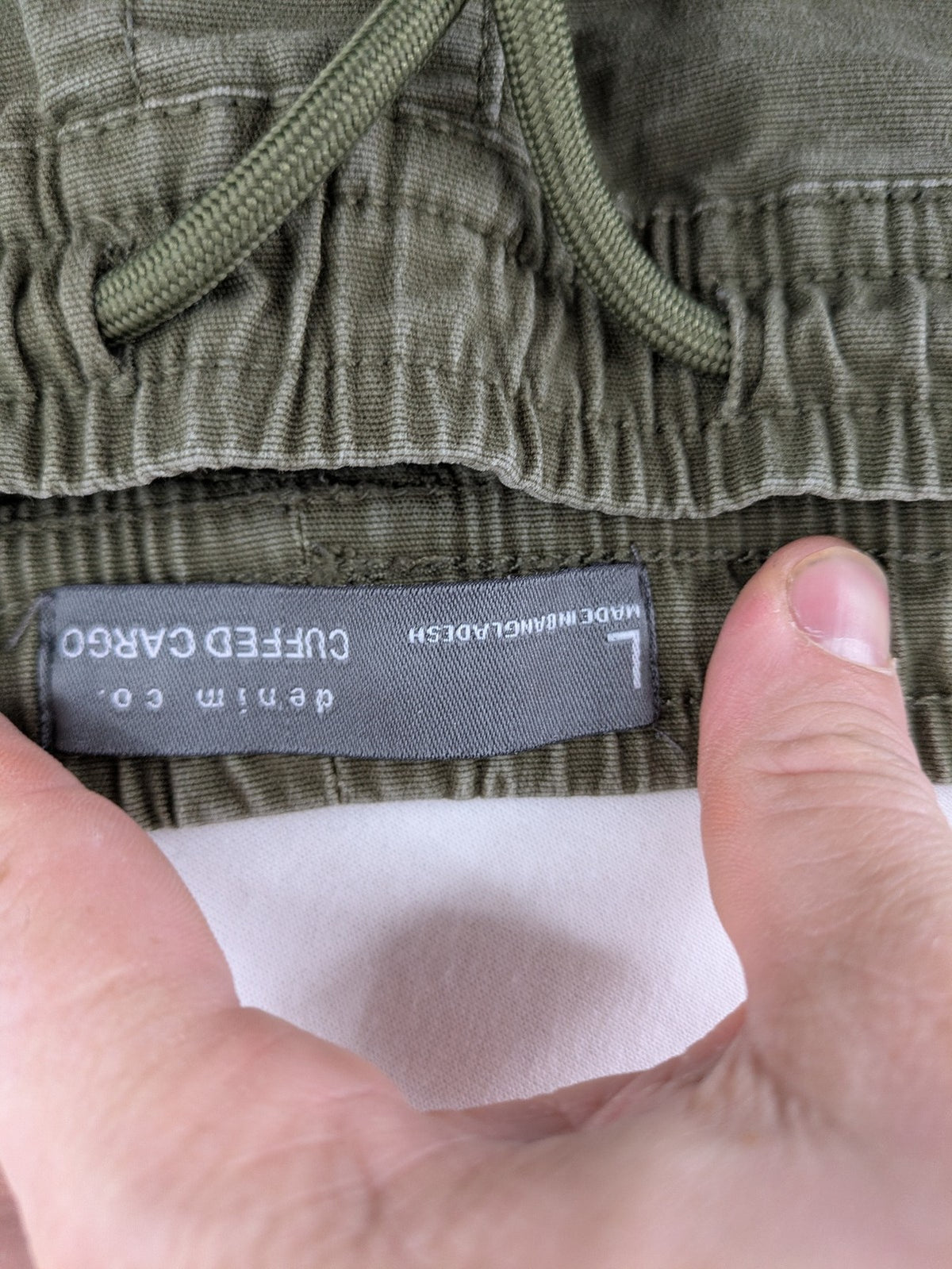 Denim & Co. khaki cargo jogger pants with elastic waistband and multiple pockets.