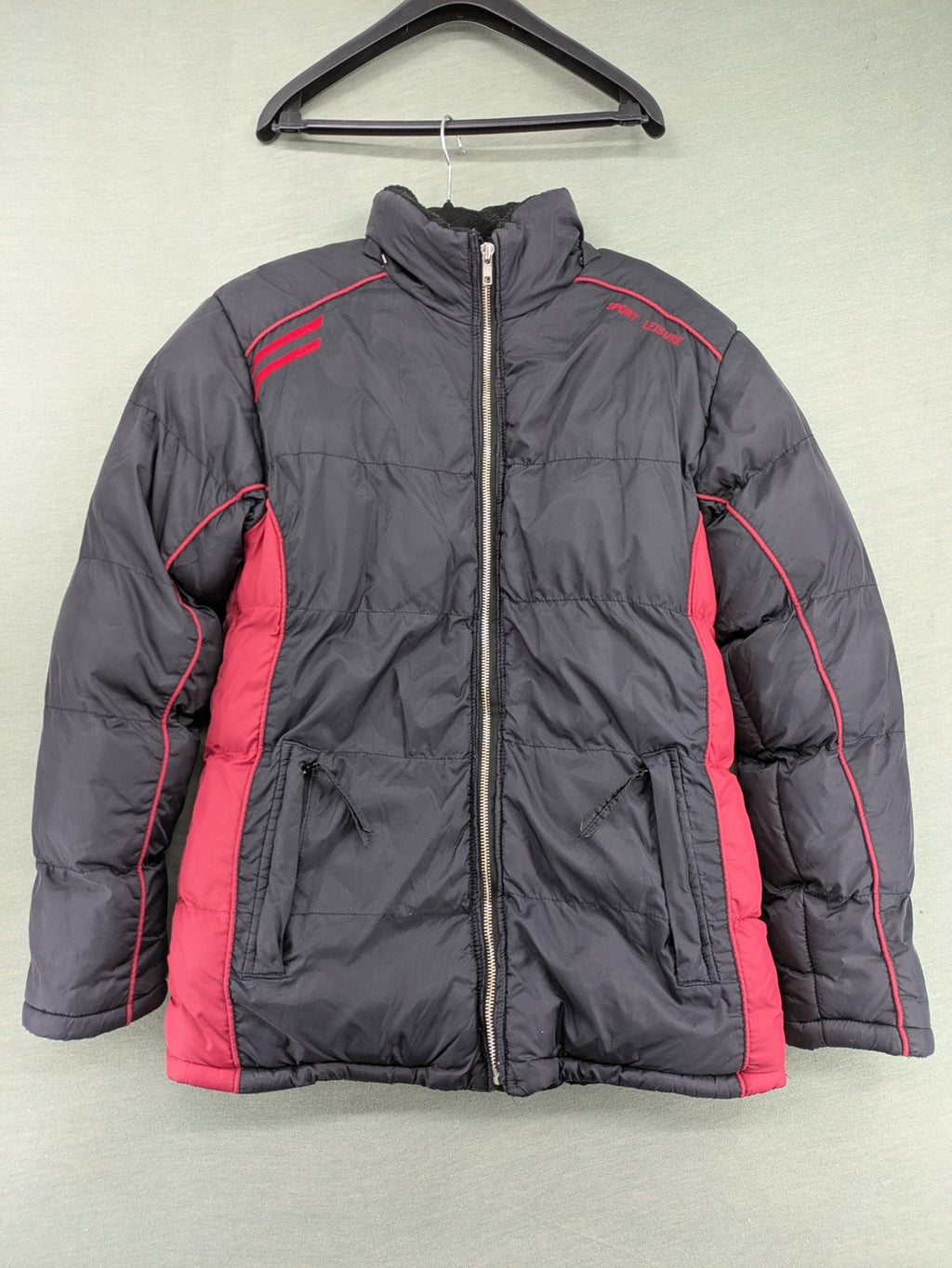 Puffer grey and red jacket with fleece lining, front zipper, and side pockets.